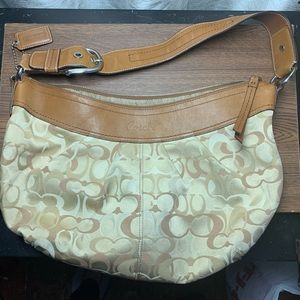 Coach scho pulley logo canvas and leather bag in excellent used condition.